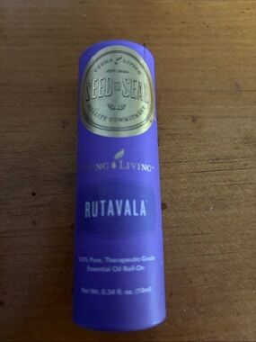 Young Living Rutavala Roll-On in Purple with Gold Seal